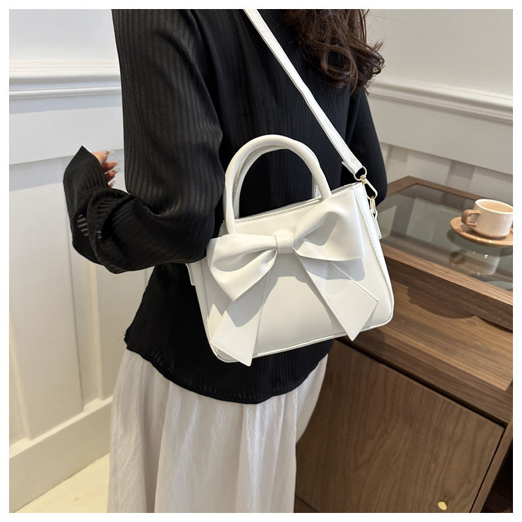 Bootara Women’s Bow-Adorned Bucket Bag - Niche-Design Mini Crossbody & Top Handle Purse for Urban Minimalist Style