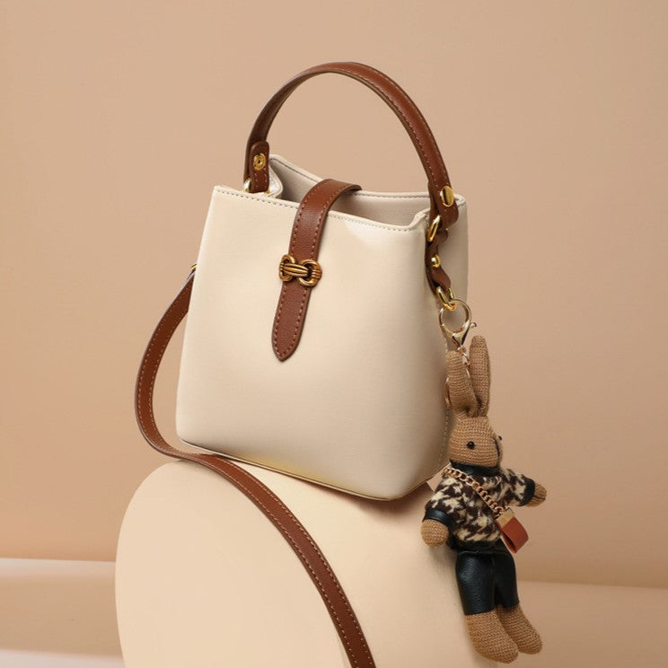 Bootara Women’s Bunny Charm Bucket Satchel — Cowhide Leather Convertible with Sculptural Clasp & Signature Whimsy