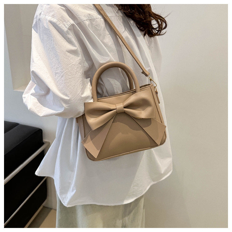 Bootara Women’s Bow-Adorned Bucket Bag - Niche-Design Mini Crossbody & Top Handle Purse for Urban Minimalist Style