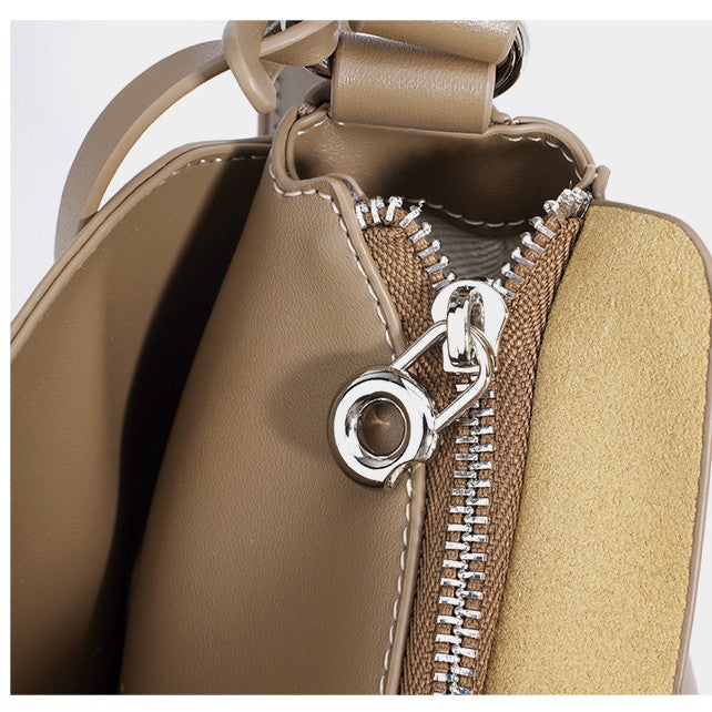 Bootara Women's Hush Rider Bucket — Genuine Leather Saddle Bag with Signature Lock Fastening & Convertible Shoulder Strap