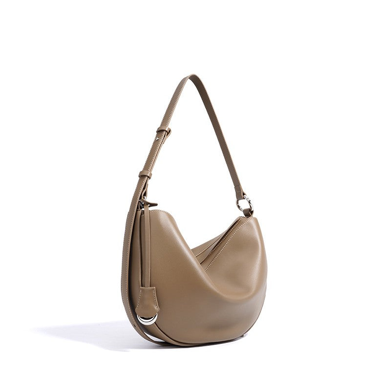 Bootara Women's Hush Rider Bucket — Genuine Leather Saddle Bag with Signature Lock Fastening & Convertible Shoulder Strap