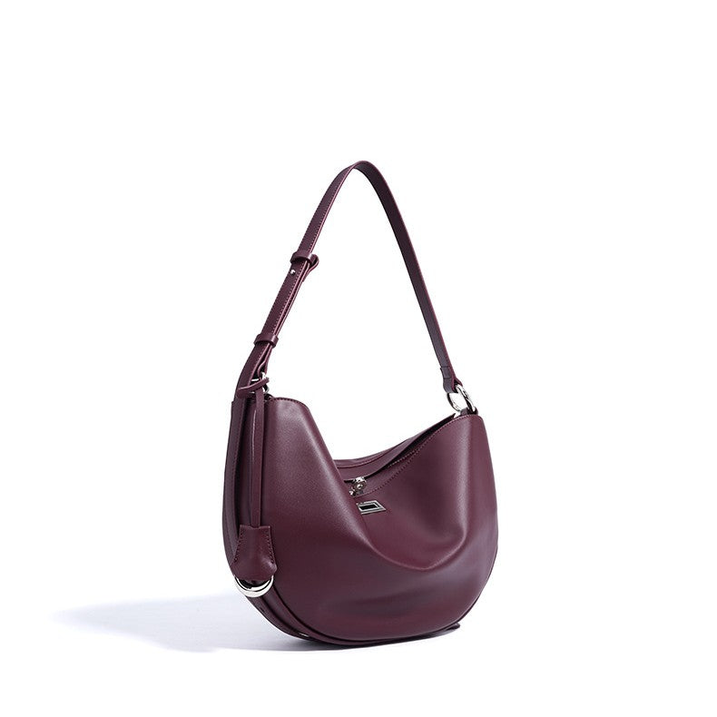 Bootara Women's Hush Rider Bucket — Genuine Leather Saddle Bag with Signature Lock Fastening & Convertible Shoulder Strap