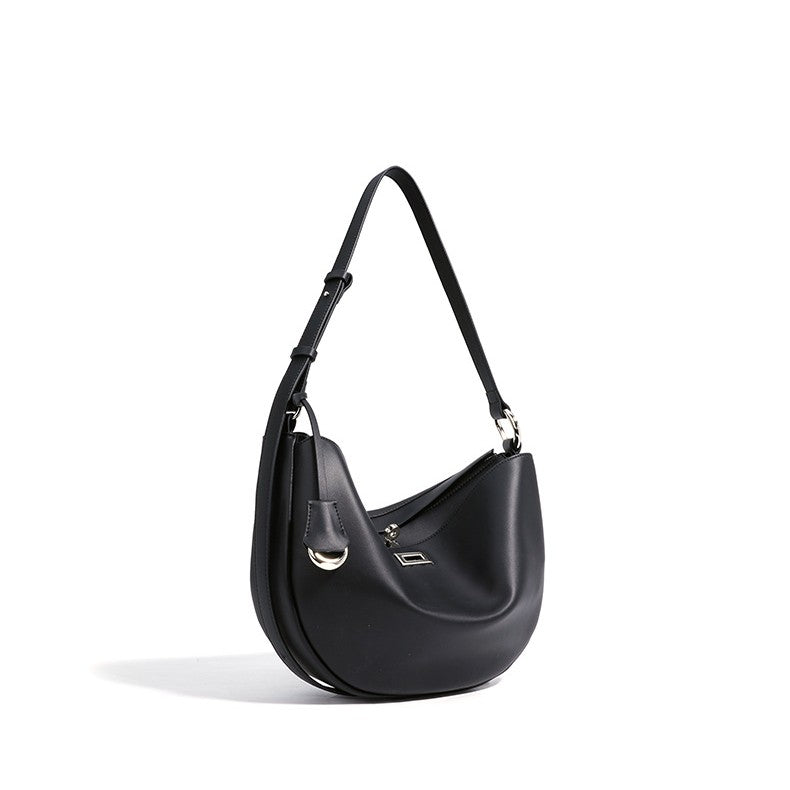 Bootara Women's Hush Rider Bucket — Genuine Leather Saddle Bag with Signature Lock Fastening & Convertible Shoulder Strap
