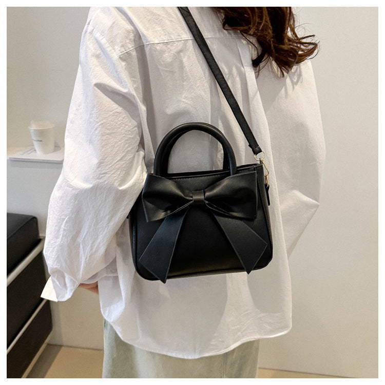 Bootara Women’s Bow-Adorned Bucket Bag - Niche-Design Mini Crossbody & Top Handle Purse for Urban Minimalist Style