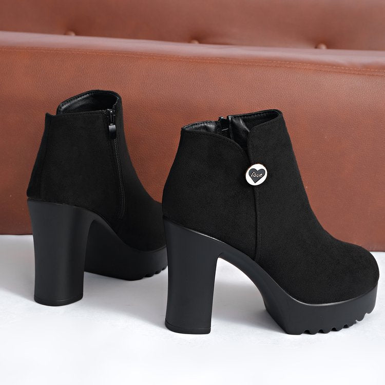 Veylisse Black platform ankle boots, rear and side pair view