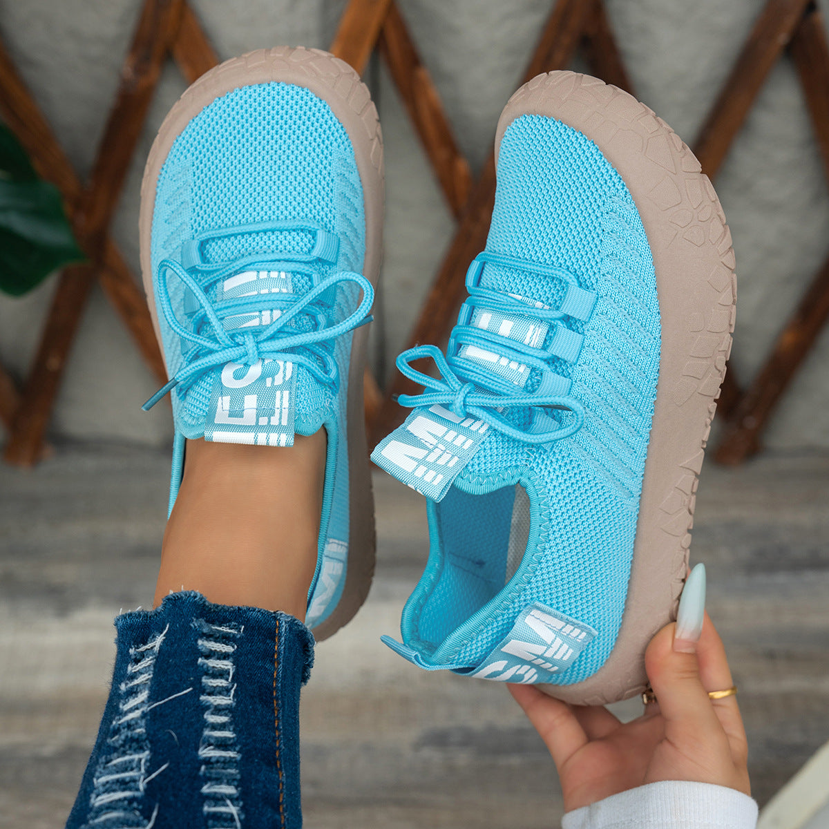Kestielle Blue knit slip-on sneakers with laces and chunky textured sole, view 3