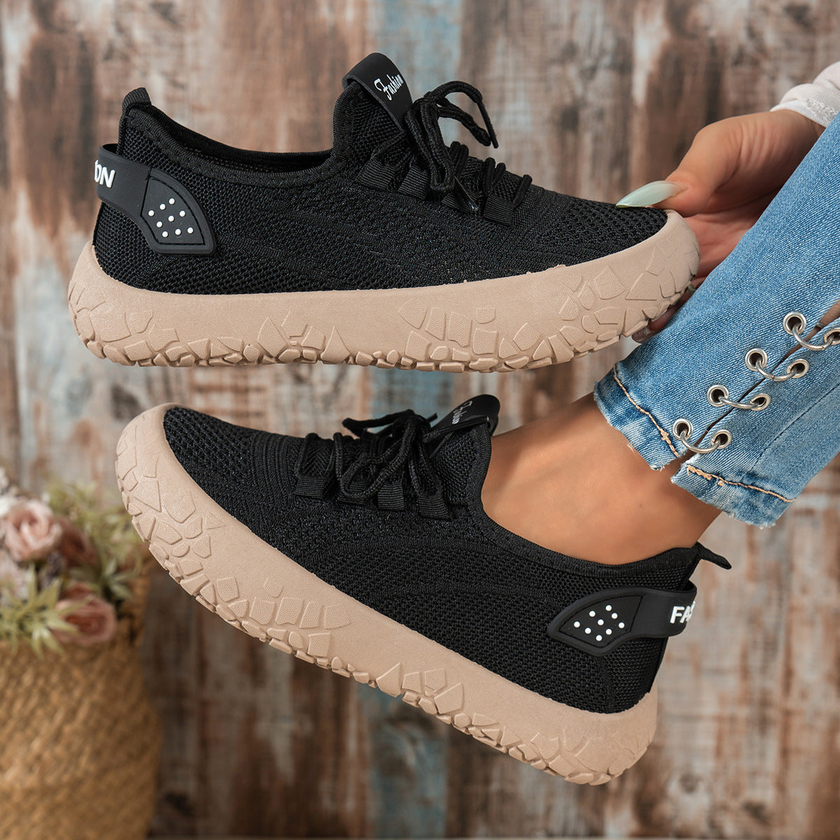 Thessalie Black knit sneakers with laces and taupe textured sole