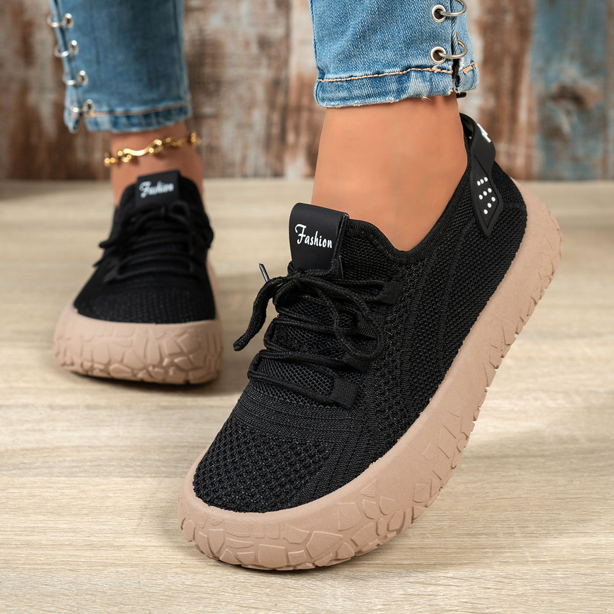 Thessalie Black knit sneakers with laces and taupe textured sole