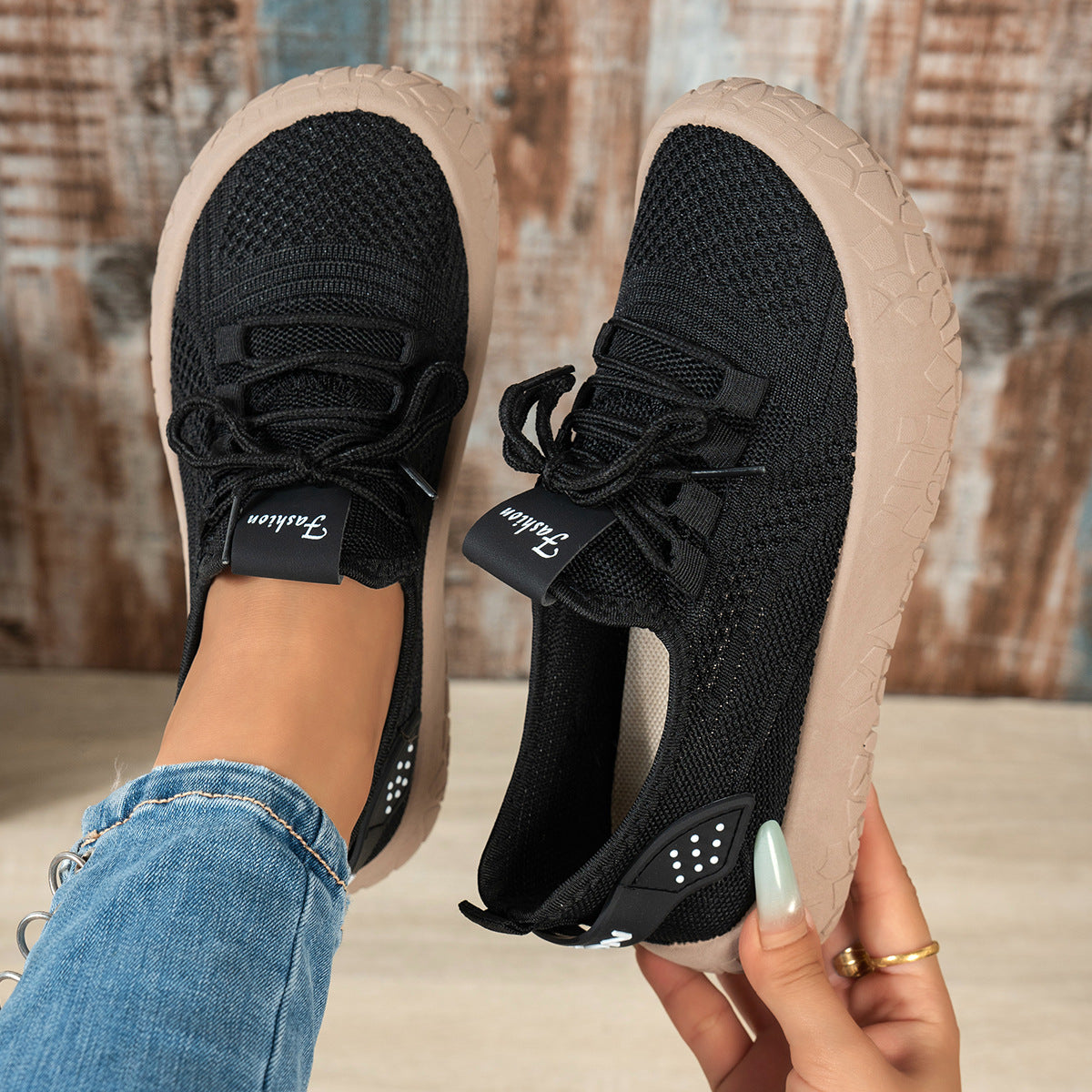 Thessalie Black knit sneakers with laces and taupe textured sole