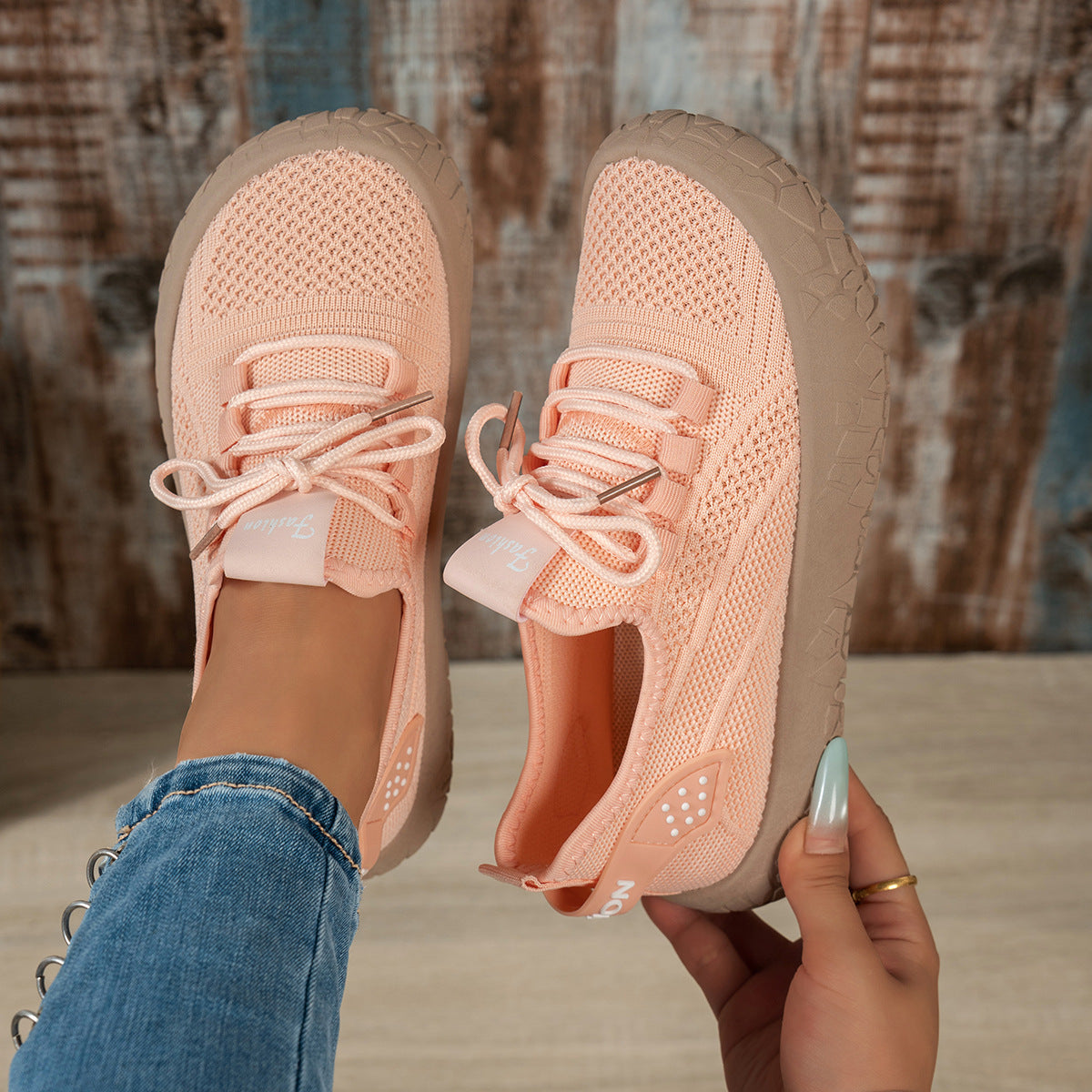 Thessalie Orange knit sneakers with laces and taupe textured sole