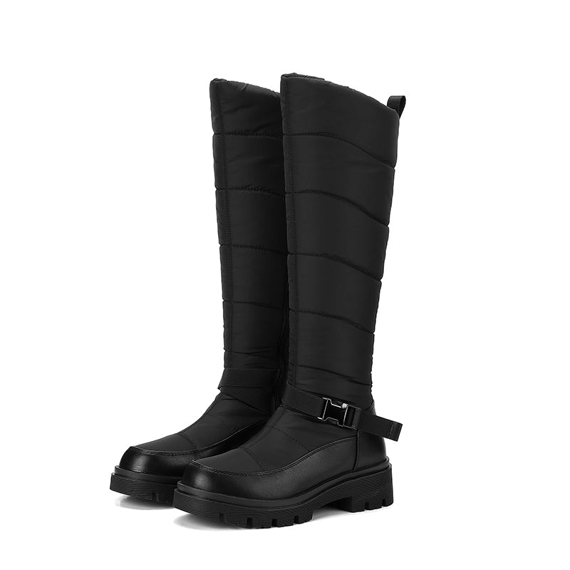 Nivrelle Black quilted knee-high winter boots with ankle buckle and lug sole