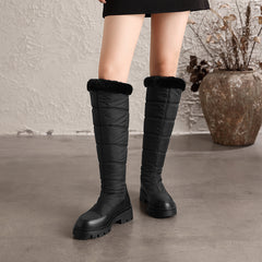 Thalvyn Black quilted knee-high winter boots with plush cuff and chunky lug sole
