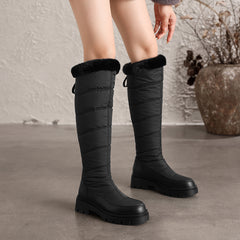 Thalvyn Black quilted knee-high winter boots with plush cuff and chunky lug sole