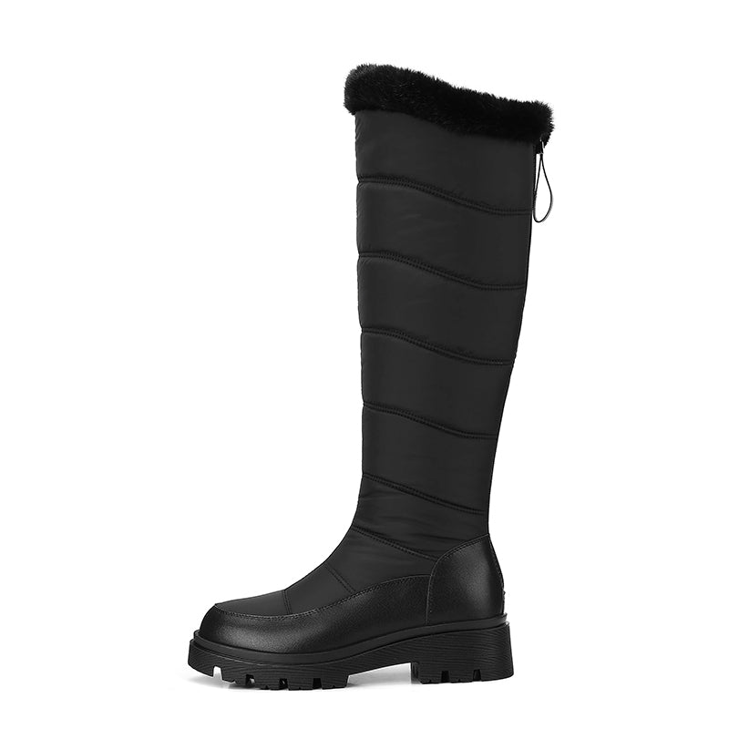 Thalvyn Black quilted knee-high winter boots with plush cuff and chunky lug sole