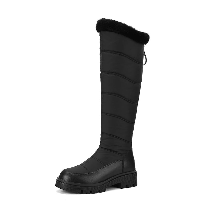 Thalvyn Black quilted knee-high winter boots with plush cuff and chunky lug sole