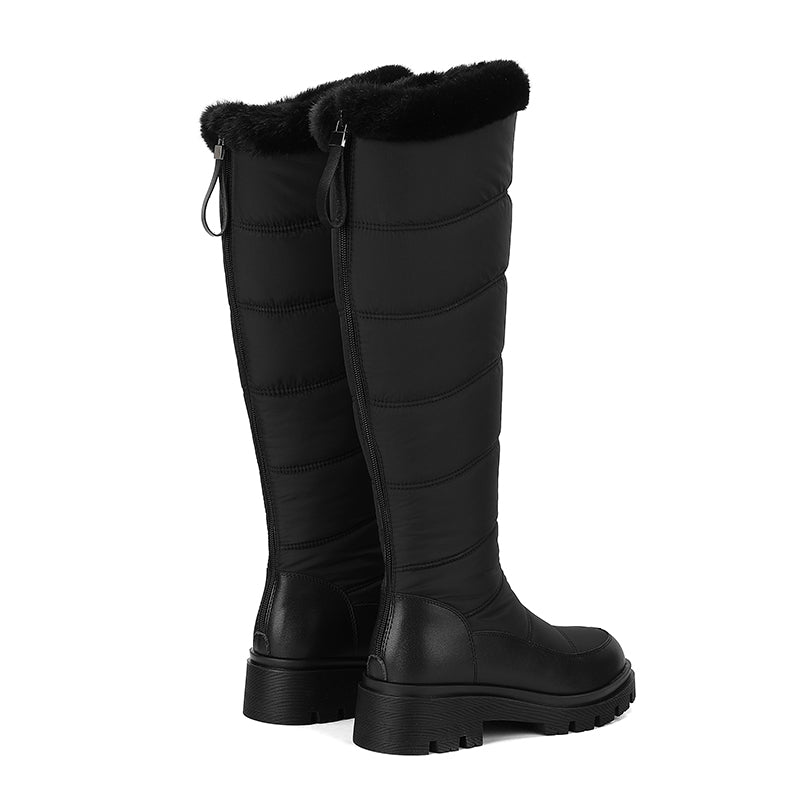 Thalvyn Black quilted knee-high winter boots with plush cuff and chunky lug sole